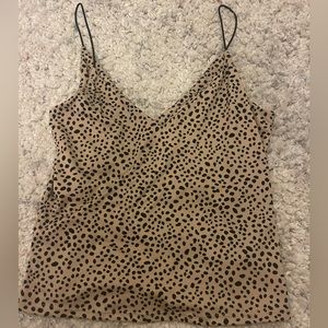 tan tank top with black dots
